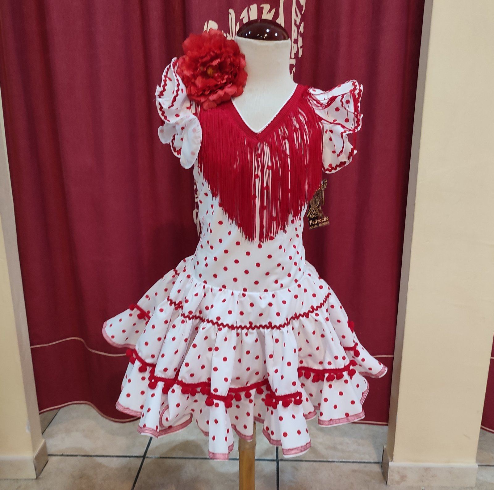 Traje de flamenca rojo lunar blanco